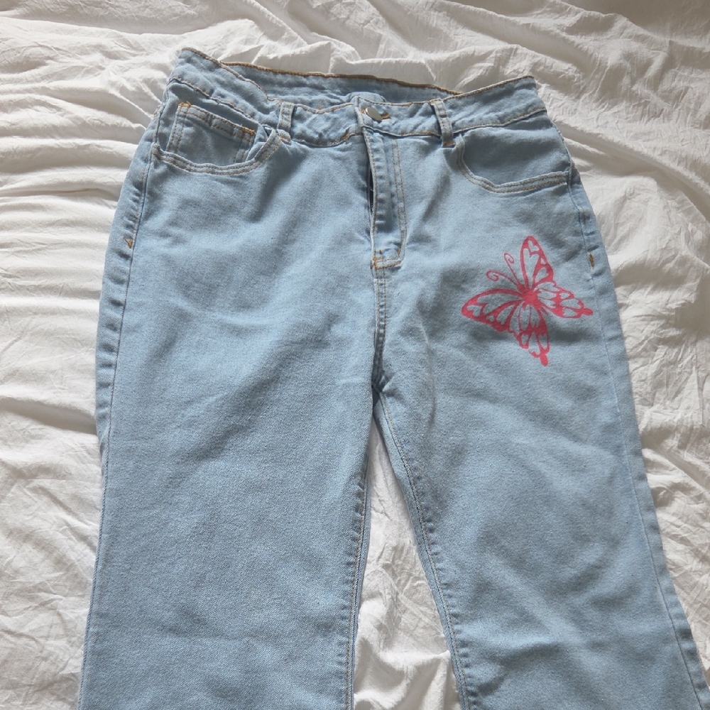SHEIN Light Blue Jeans with Pink Butterfly Accent